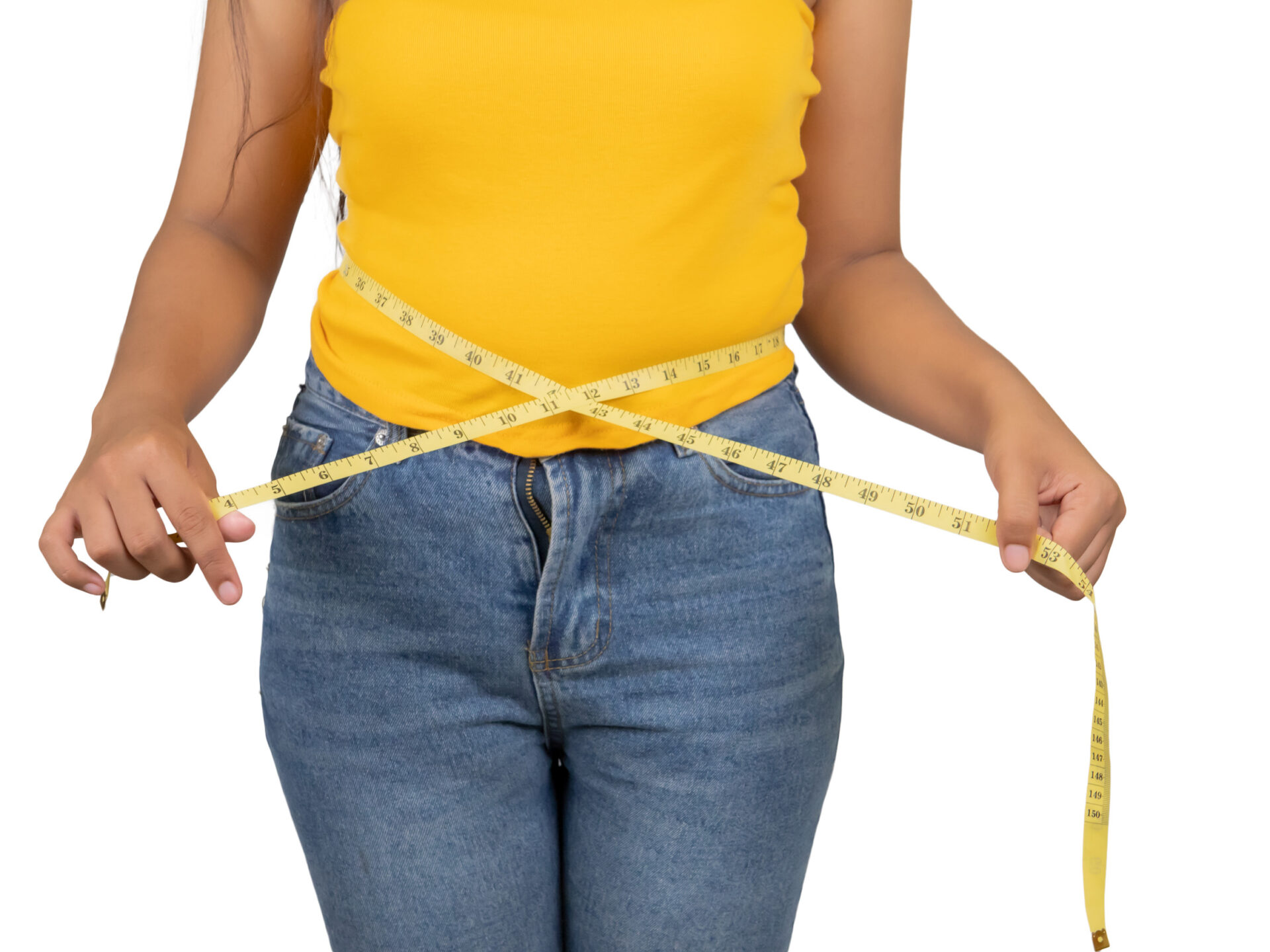 female hands measuring waist with measuring tape.